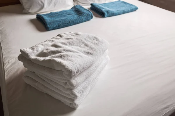 towels on the bed in the house