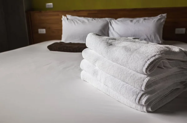 towels on the bed in the house