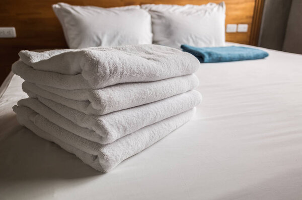 towels on the bed in the house