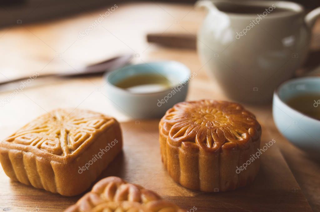Chinese mid autumn festival food of mooncake with tea