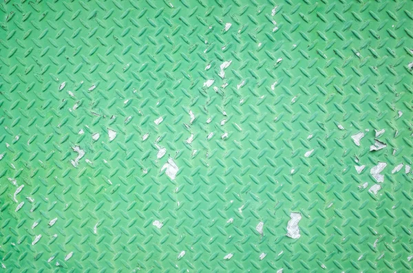 background of metal diamond plate in green color