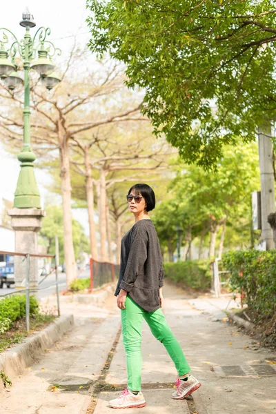 Modern Asian beauty with glasses — Stock Photo, Image