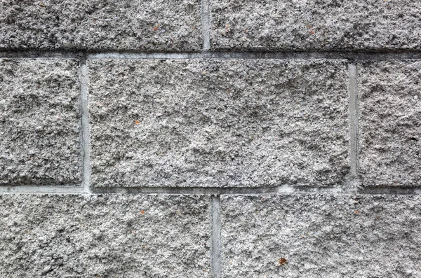 灰色のレンガの壁の背景 — ストック写真
