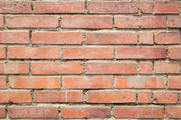 Fondo de la pared de ladrillos rojos — Foto de Stock