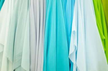 renkli kumaş yığınları arka plan