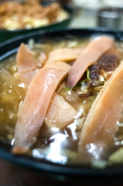 Noodles in squid thick soup — Stock Photo, Image