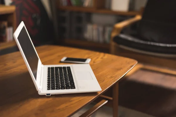 Laptop on desk — Stock Photo, Image