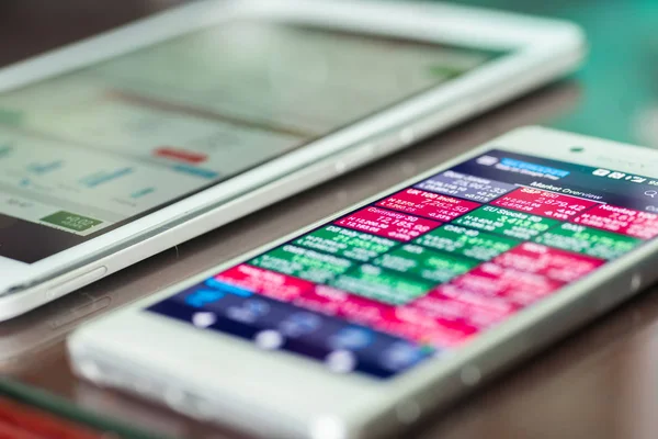 stock market application on touchscreen smartphone