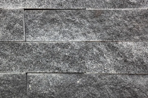Parede de tijolo cinza com textura áspera — Fotografia de Stock