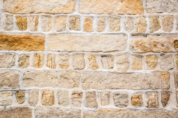 Leeftijd gele bakstenen muur — Stockfoto