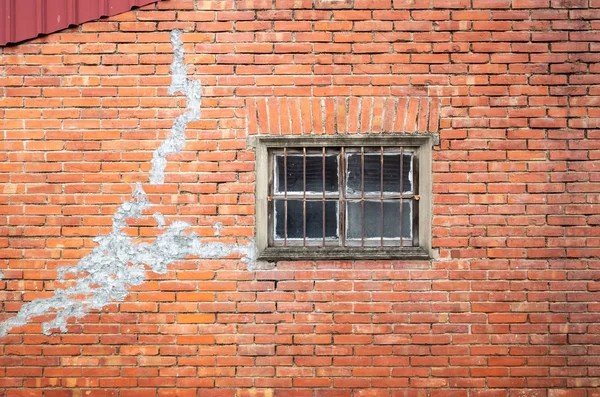 Old window on red brick wall — Stock Photo, Image