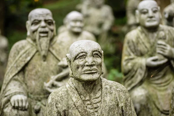 Skupina buddhistické Arhat kamenné sochy — Stock fotografie