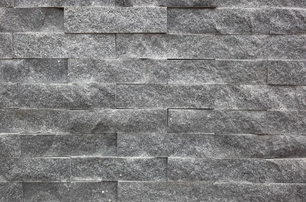 Muro di mattoni grigi con texture ruvida — Foto Stock