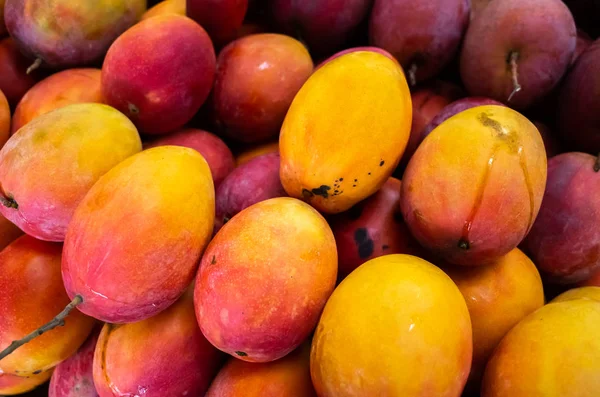 Red stacks of mango fruits — Stock Photo, Image