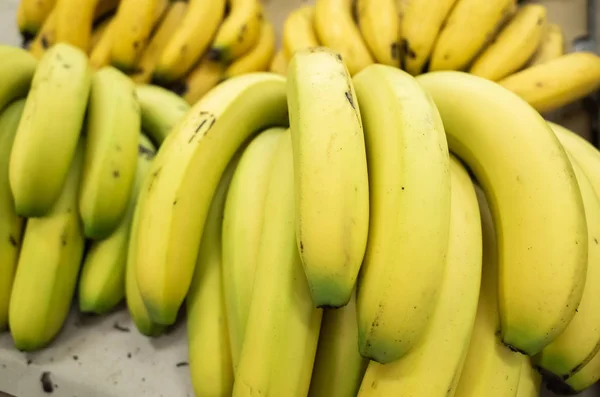 Banana fruit stacked on the marketplace — Stock Photo, Image