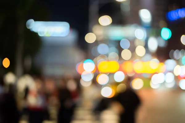 Sfondo astratto con persone che camminano per strada — Foto Stock