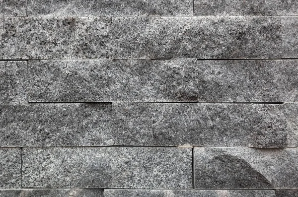 Parede de tijolo cinza com textura áspera — Fotografia de Stock