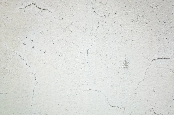 Fundo de parede cinza rachado e envelhecido — Fotografia de Stock