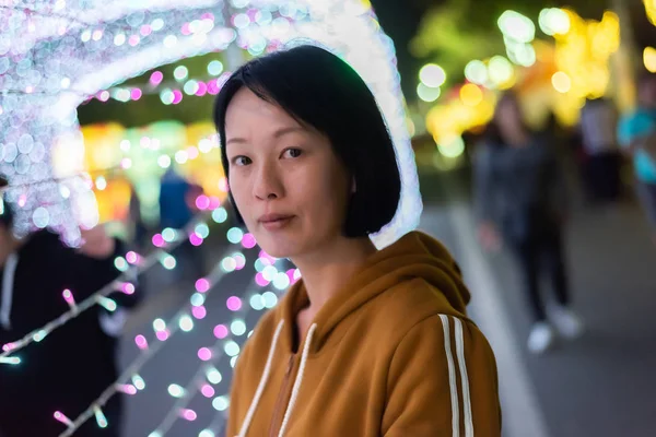 Asian woman face at night — Stock Photo, Image