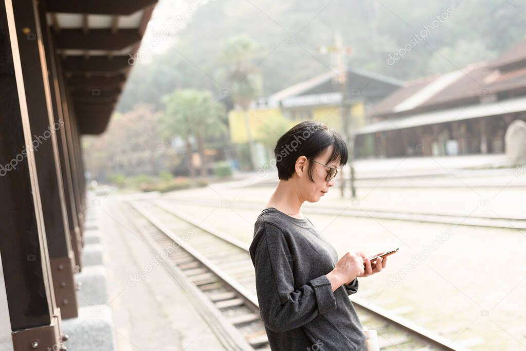 Asian beauty using a smart phone