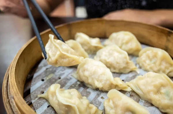 Taiwanese famous snacks of steamed dumplings on table in a restaurant