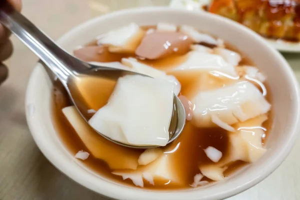 taiwanese traditional snack of tofu pudding, closeup images