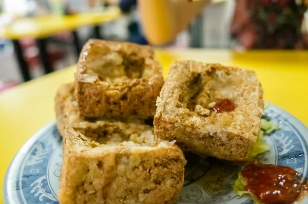 famous Taiwanese snack of stinky tofu on the table