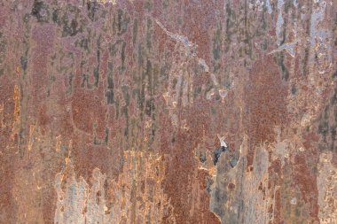 Kirli yüzeyi ve lekeleri olan paslı metal dokusu
