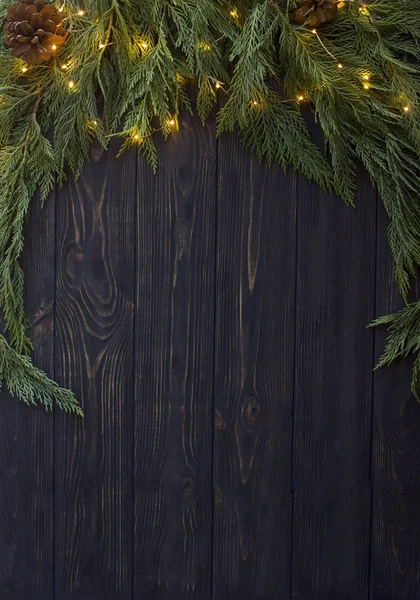 Χριστούγεννα ξύλο, κυπαρίσσι και χρυσή φώτα φόντο — Φωτογραφία Αρχείου
