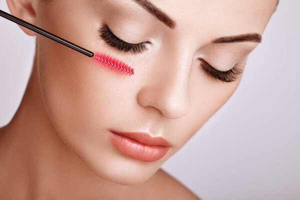 Beautiful Woman with Extreme Long False Eyelashes. Eyelash Extensions. Makeup, Cosmetics. Beauty, Skincare