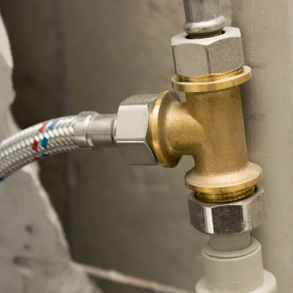 Brass fitting in water supply system — Stock Photo, Image