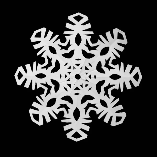 White Snowflake Cut Out Paper Lies Black Background — Stock Vector