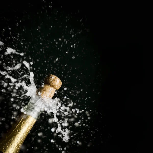 Bottle Champagne Cork Popping Out Splashes Stock Image