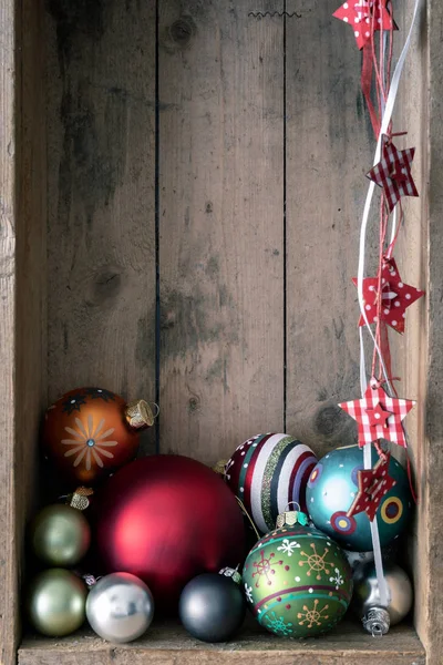 Christmas Decoration Glass Balls Stars Wooden Box Background — Stock Photo, Image