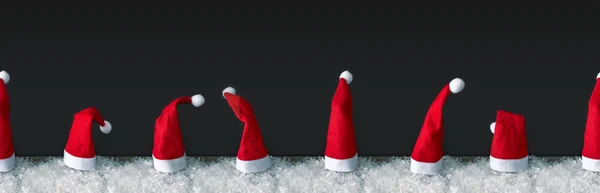 Uma Imagem Uma Linha Sem Costura Chapéus Vermelhos Papai Noel — Fotografia de Stock