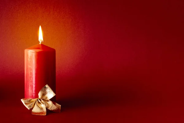 Christmas Decoration Burning Candle Red Background — Stock Photo, Image