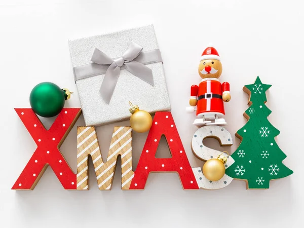 Een Decoratie Van Kerstmis Met Xmas Tekst Enkele Glazen Bollen — Stockfoto