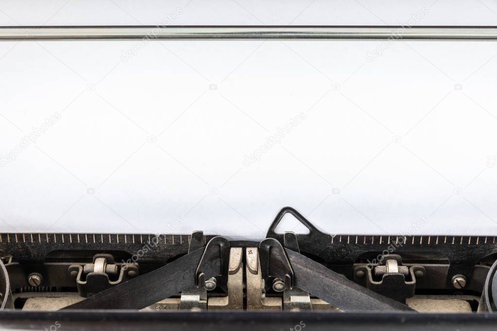 Vintage typewriter header with blank sheet of white paper