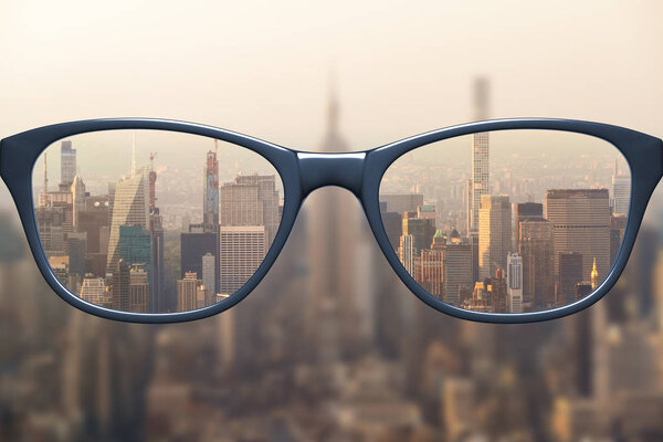 View through glasses on cityscape 