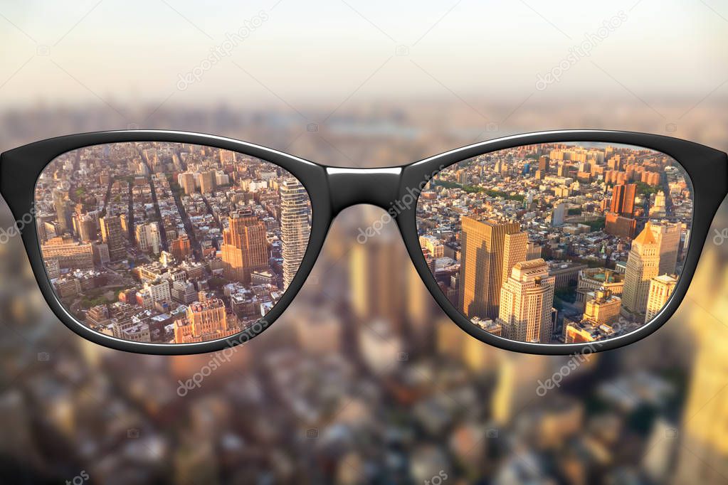 View through glasses on cityscape 
