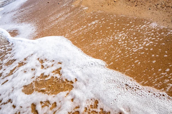 Detail pobřeží na písečné pláži v Itálii — Stock fotografie