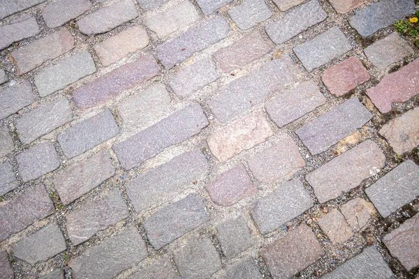 Geplaveide straat achtergrondstructuur — Stockfoto