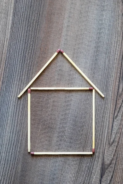 Simple house of match sticks — Stock Photo, Image