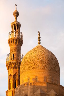 The Aqsunqur mosque in Cairo Egypt at sunset clipart