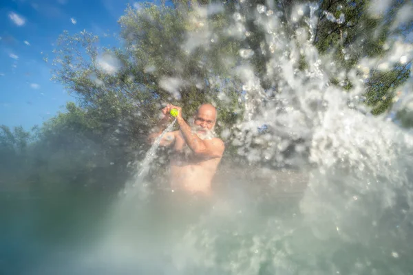 Water battle at the summer lake — Stock Photo, Image