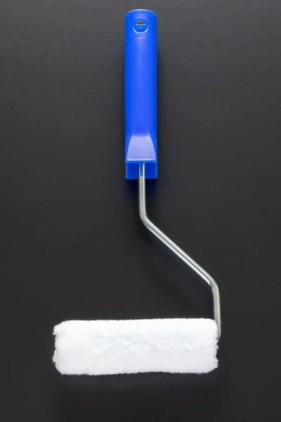 Painting roller isolated on black background — Stock Photo, Image