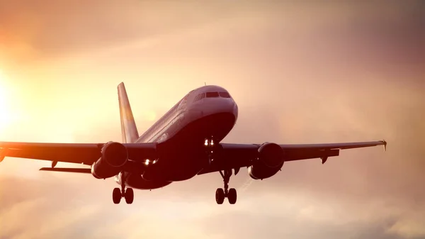 Avião no céu por do sol — Fotografia de Stock