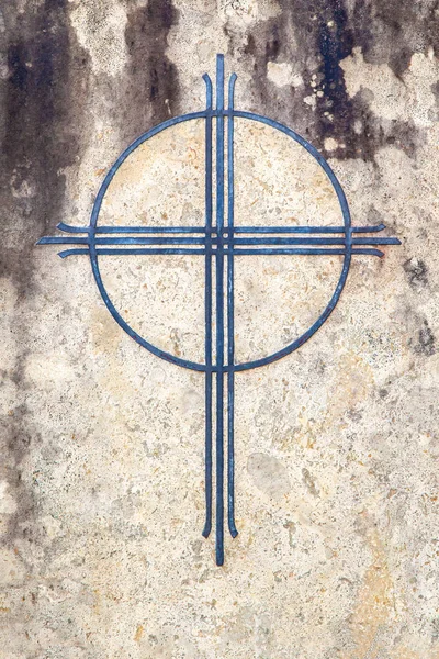 Cross at a grave stone — Stock Photo, Image