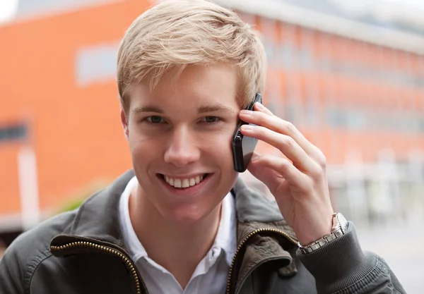 Young guy with cellphone — Stock Photo, Image