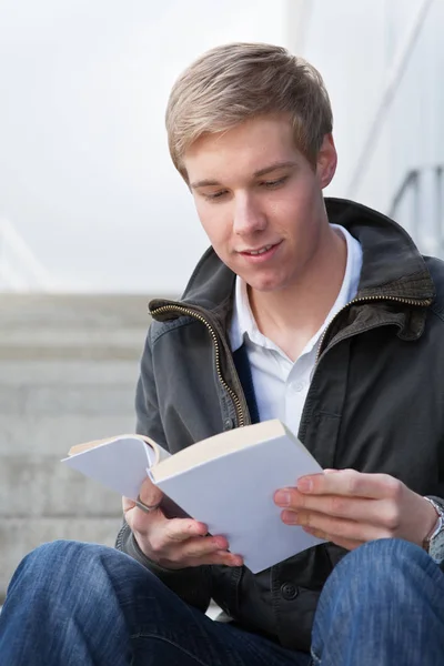 Young guy with book Stock Photo